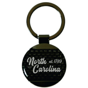 NORTH CAROLINA KEYCHAIN CARBON FIBER ROUND RETRO SCRIPT