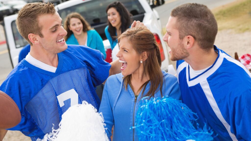 sports fans at a tailgate party