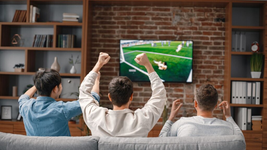 group of guys watching the game