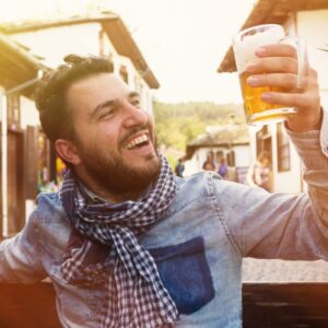 man drinking a beer