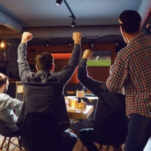 group of guys watching the game